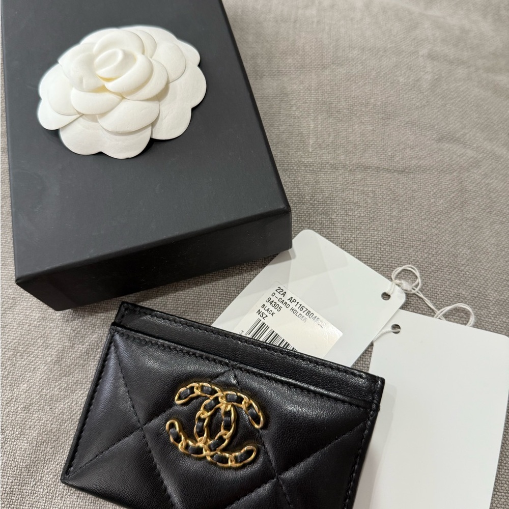CHANEL Black Quilted Card Holder with Gold Logo